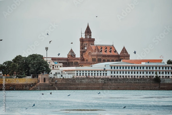 Obraz Scenic view of Hamirsar lake with Pragmahal Palace at time of evening. At Bhuj, Gujarat, India	