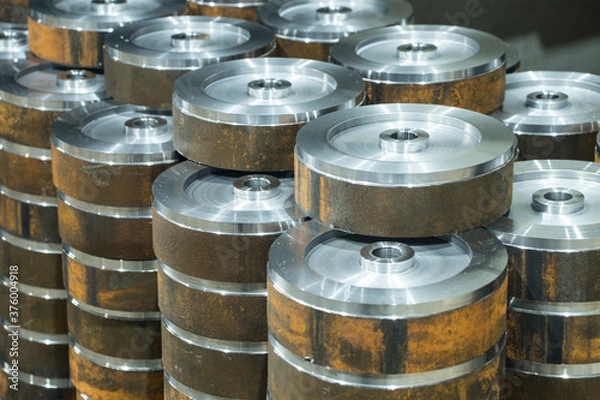 Fototapeta Metalworking of parts on CNC machines. Metal products turned on a lathe, close-up.