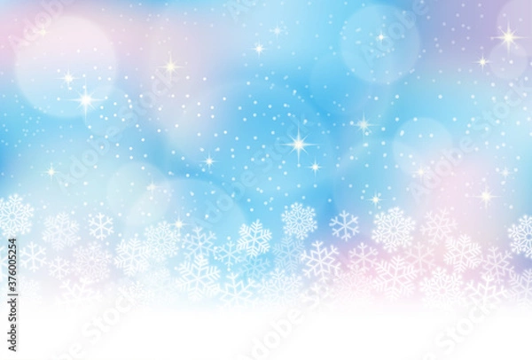 Obraz 雪の結晶、冬のイメージの水色背景素材