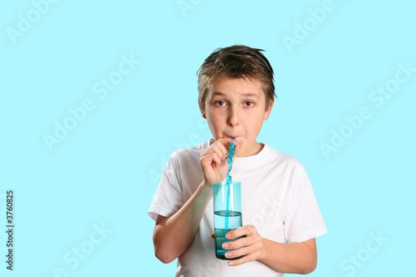 Obraz A child drinking pure fresh water.