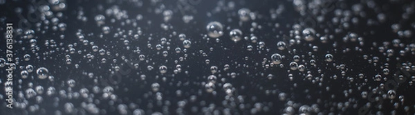 Fototapeta Tło zdjęcie panoramiczne pęcherzyków powietrza na powierzchni wody. Zbliżenie pęcherzyków powietrza w cieczy. Selektywna ostrość.