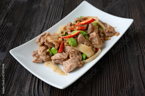 Fototapeta Stir Fried Pork with Shrimp Paste and bitter beans.
