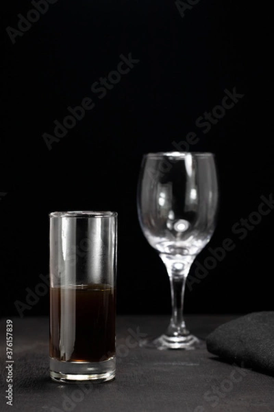 Obraz glass of coffee splash on dark background, shot of coffee