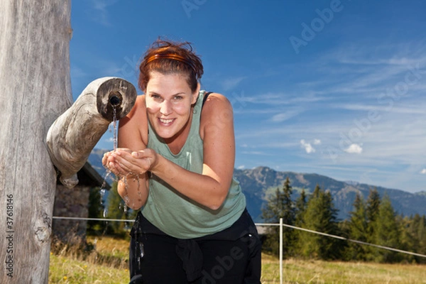 Fototapeta Enjoying fresh mountain water