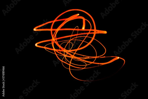 Obraz Creative Conceptual Fine Art Photography Motion Blur Sparkle Light Trail On Dark Background Copy Space For Text. Artistic design by lamp fire flame line at night slow shutter speed of camera exposure.
