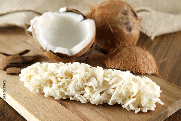 Obraz Cocada, coconut candy. Composition on wooden background.