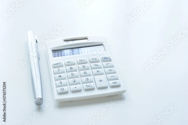 Obraz  Calculator on a white desk