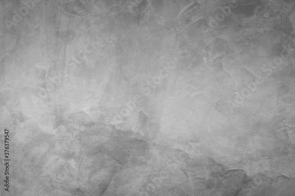 Fototapeta Abstract background of modern loft cement texture. The gray concrete wall has some scratch without a fixed pattern. Can be used in graphic design and for creating various backgrounds.