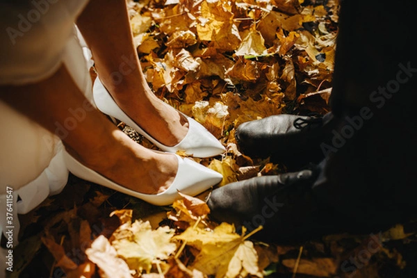 Fototapeta bride and groom legs