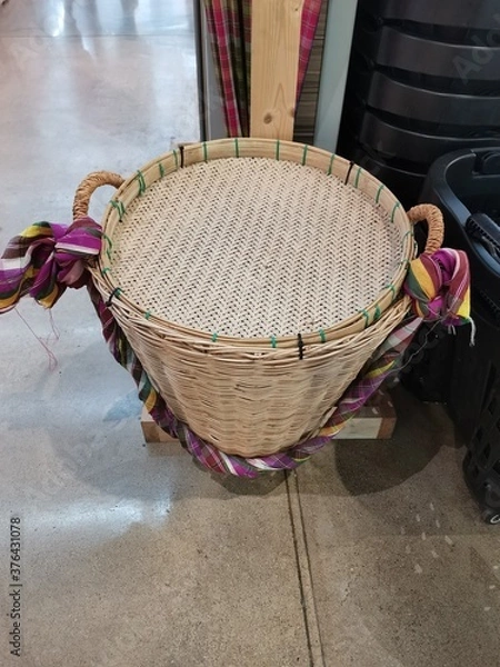 Obraz wicker basket on a table