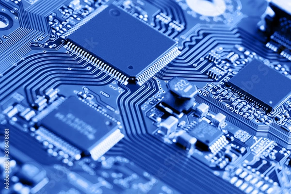 Obraz Electronic circuit board close up. Blue background.