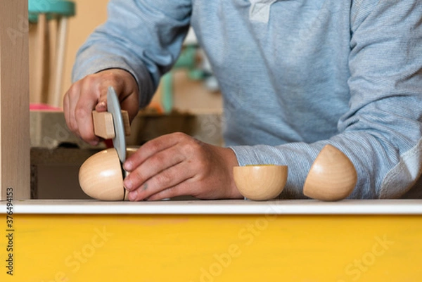 Obraz Child playing with kitchen toys