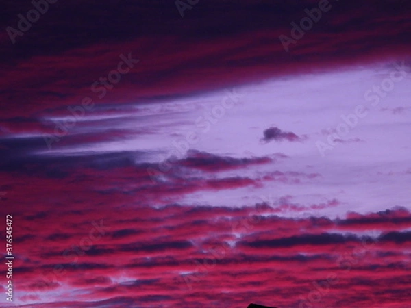 Fototapeta Rippling red clouds