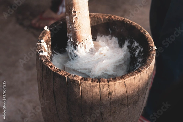 Obraz A tribal tradition that runs once a year is pounding Pook rice to preserve the tradition