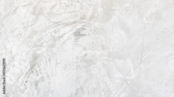 Fototapeta White cement wall background in vintage style for graphic design or wallpaper. Pattern of soft concrete floor in retro concept.