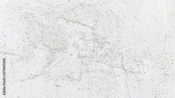 Fototapeta Vintage white old plaster wall background for graphic design or wallpaper Soft concrete floor pattern in retro concept
