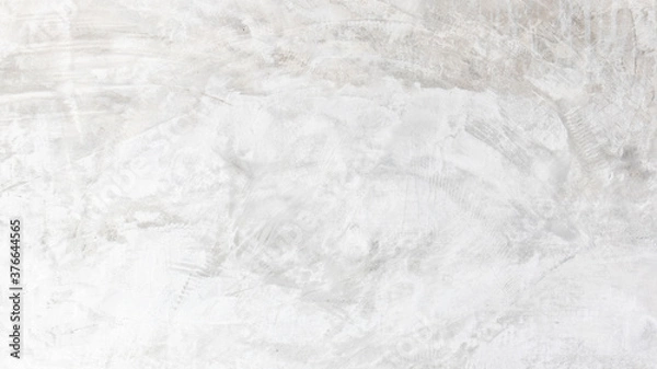 Fototapeta White cement wall background in vintage style for graphic design or wallpaper. Pattern of soft concrete floor in retro concept.