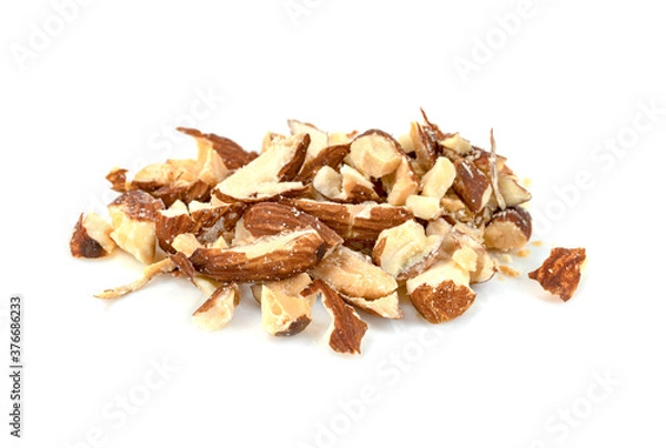 Obraz broken almonds isolated on white background
