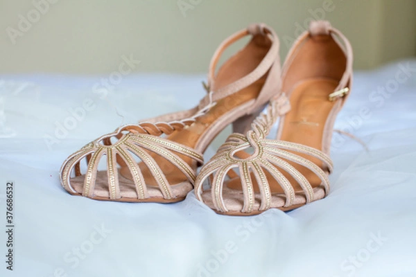 Obraz women's shoes on the bed sandals with heels