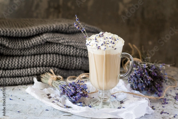 Obraz Hot lavender raf latte cappuccino with dried lavender on wooden table. Good Morning concept. Selective focus.