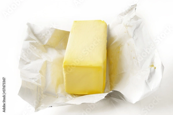 Obraz butter on the opened wrapping