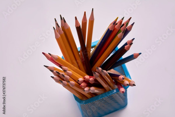 Obraz pencils in a office glass on a white background