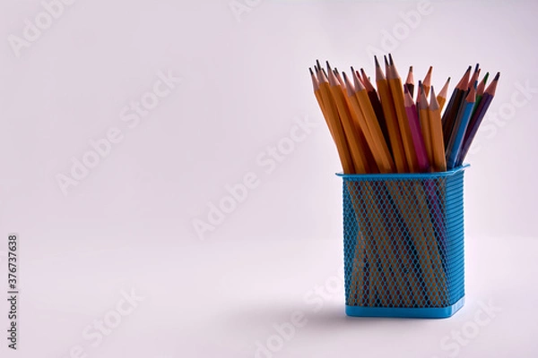 Obraz pencils in a office glass on a white background