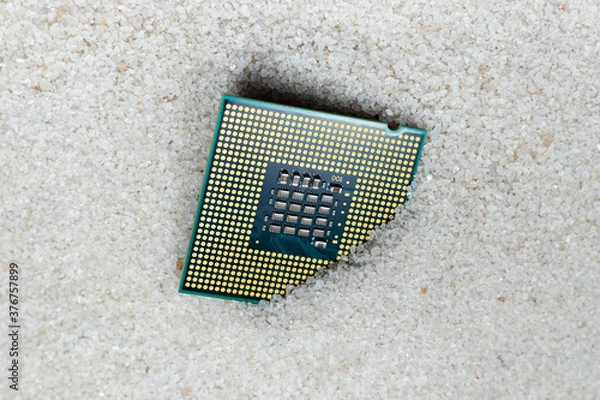 Fototapeta CPU unit processor on silica sand