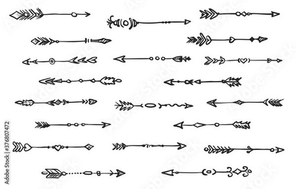 Fototapeta Boho arrow icon. Tribal arrow boho doodle style isolated icon set on white. Rustic weapon with feather, arrowhead, decor element and ornament illustration. Vector hand drawn ethnic collection