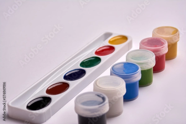 Obraz watercolor paint and gouache paints on a white background