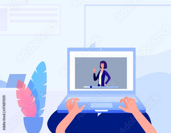 Fototapeta student having online classes on his laptop. 