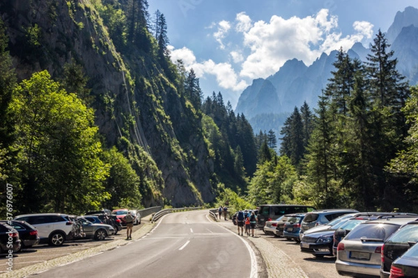 Fototapeta road in the austrian alps on a sunny day