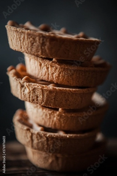 Fototapeta Oriental cinnamon cookies on the table in a stack