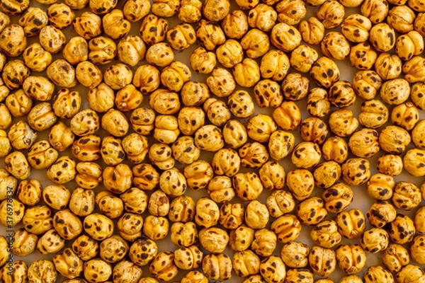 Obraz Roasted,yellow chickpeas background,top view,flat layout