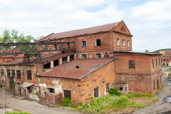 Fototapeta The old plant of copper ore processing plant, built in the times of Demidov in Sysert', Russia