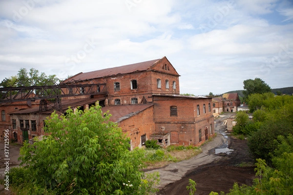 Fototapeta The old plant of copper ore processing plant, built in the times of Demidov in Sysert', Russia