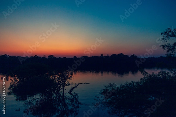 Obraz Sunrise on Amazon forest river