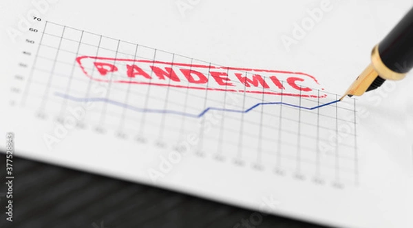 Fototapeta Macro shot of red stamp pandemic on a chart and fountain pen.