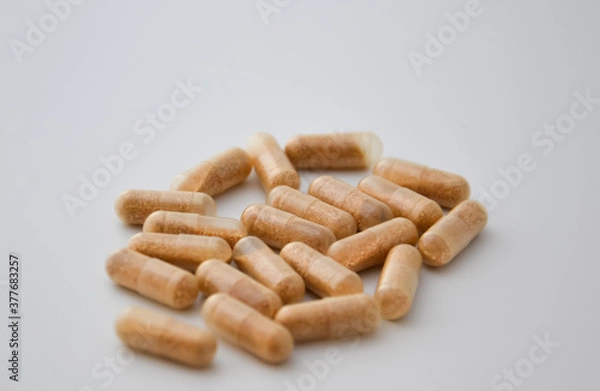 Fototapeta Isolated group of pills on a white background