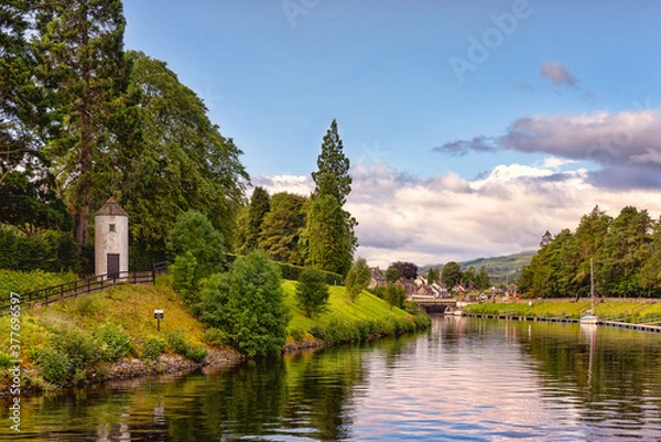Fototapeta The Caledonian canal in scottish countryside, United Kingdom. This 97 Km long canal connects the Scottish east coast at Inverness with the west coast at Corpach near Fort William in Scotland