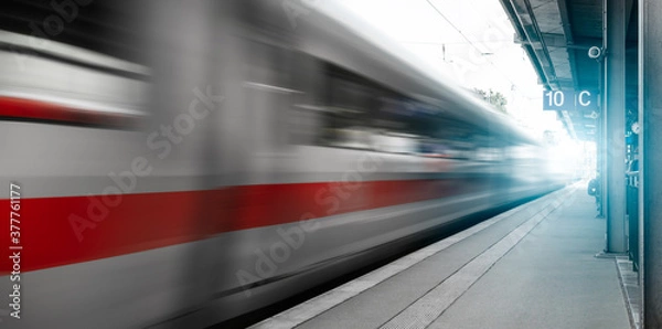Fototapeta Abstract background travel of public transportation with blur speed motion movement of train on railway tunnel subway.