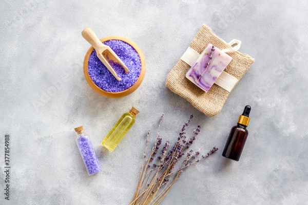 Obraz Lavender spa set. Violet bath salt, essence oil on grey stone background