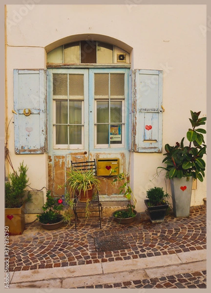 Fototapeta External of Mediterranean house, old shutter and flowers