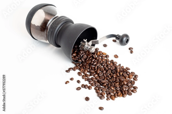 Obraz coffee grinder with coffee beans on white background