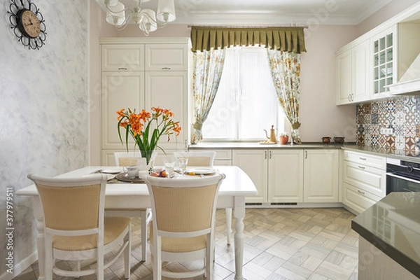 Obraz Classic white kitchen with served dining area