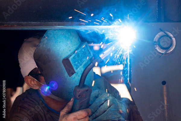 Obraz welder working in the factory