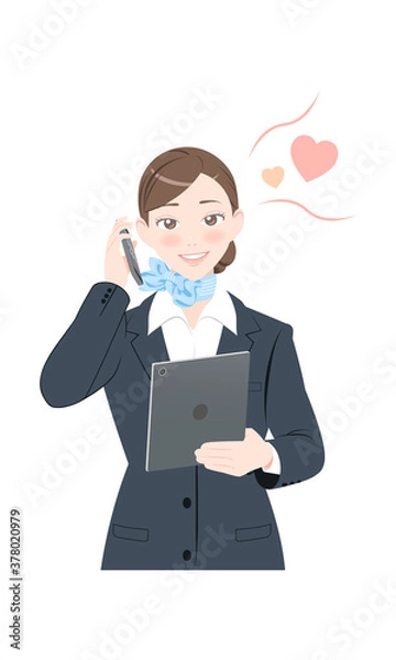 Fototapeta 電話　照れる　タブレット　ポーズ　ビジネス　スーツ　女性