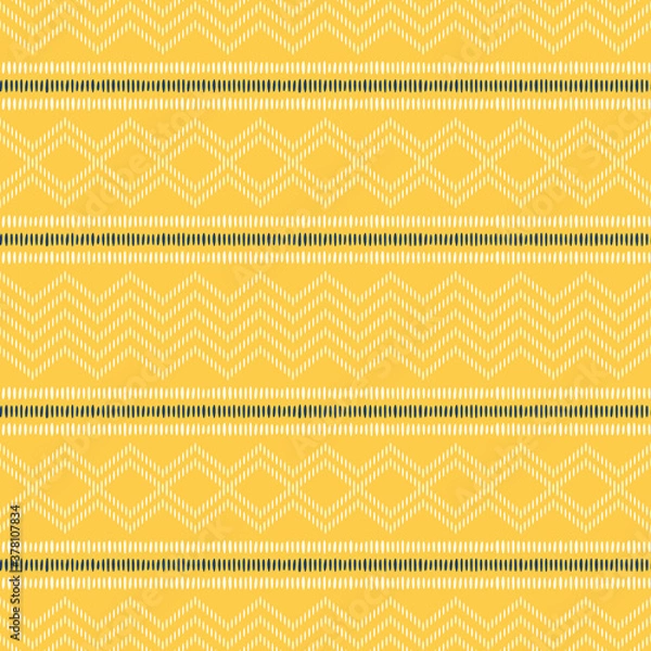 Fototapeta Ornamental boho stripes seamless vector pattern. Neutral woven design for home decor and fashion textile. Abstract decorative stripes with tribal style elements in white and blue on yellow backdrop.