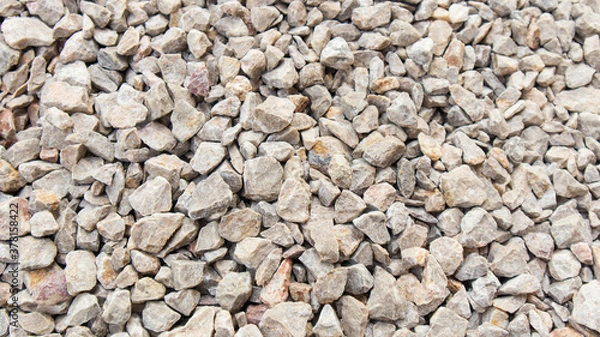 Fototapeta Top view of the Pebbles on the walkway.stone grit scree on floor.stone grit scree background.
