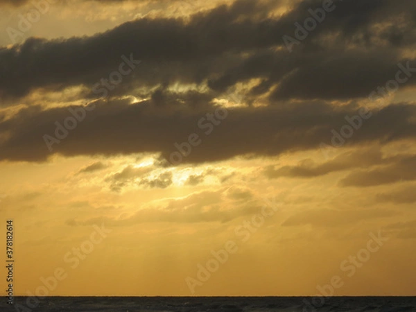 Obraz sunset over the ocean